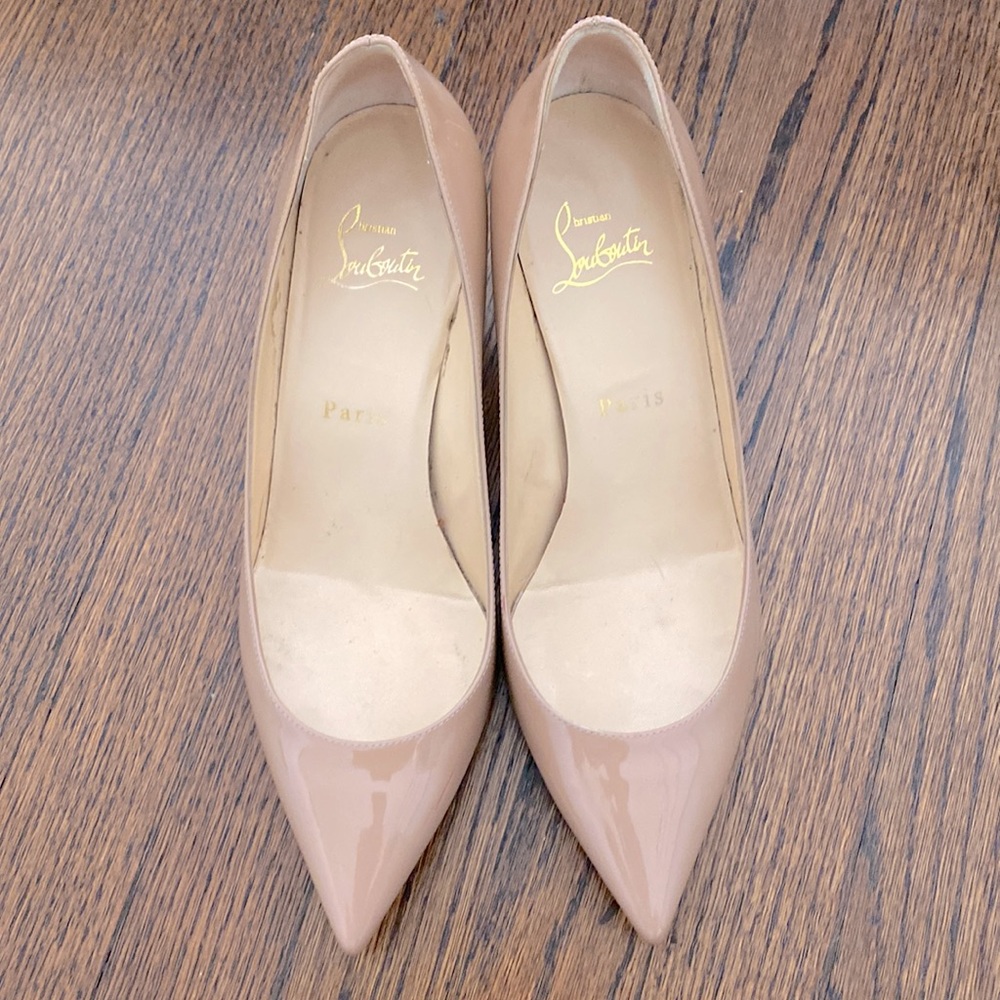 Christian Louboutin in nude color size 7 kitten heels. Awesome shape!